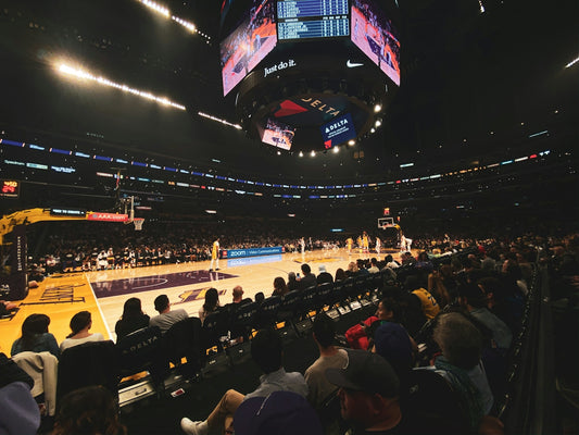 people sitting on chairs watching game