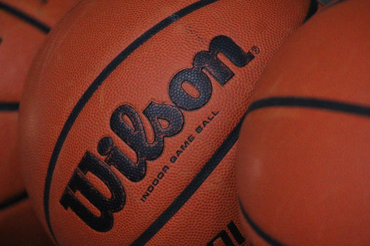 a group of basketballs sitting next to each other