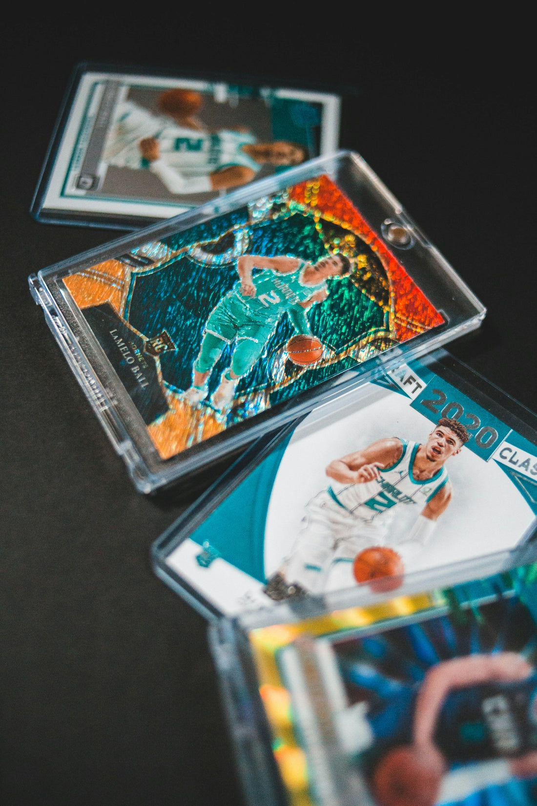 a couple of baseball cards sitting on top of a table